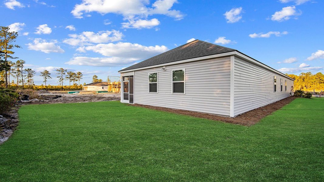 Exterior details and patio area of a home in The Lakes at North Glynn, Brunswick (Image 5).