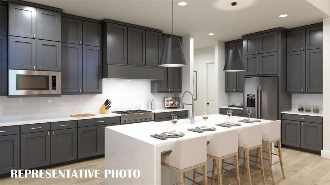 With fantastic style, prep and storage space, all the cooks in the family will love this ourstanding kitchen!  REPRESENTATIVE PHOTO
