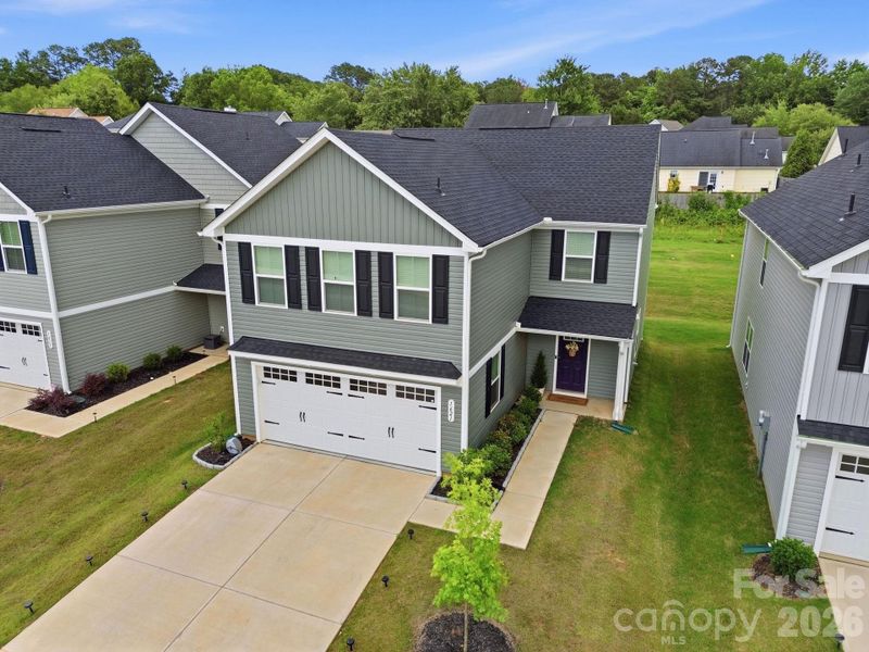 Front exterior of a new home in , Charlotte, NC, highlighting curb appeal (Image 1). Front exterior of a new home in , Charlotte, NC, highlighting curb appeal (Image 1).