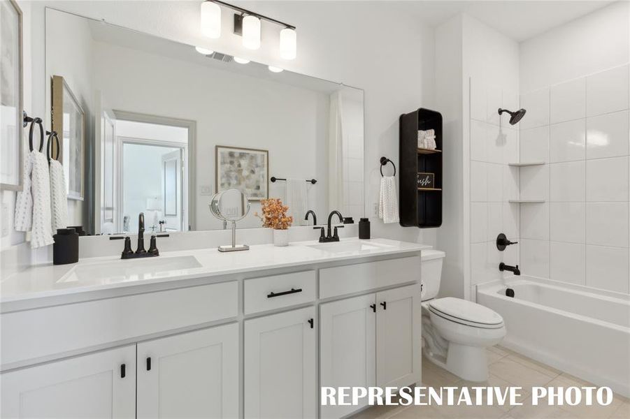 Guests will enjoy their own space in this thoughtfully designed, dual sink guest bath.  REPRESENTATIVE PHOTO