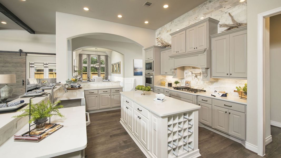 Representative furnished interior of a home built from the 3578W by Perry Homes in Lakes of Cane Island, Katy (Image 29).