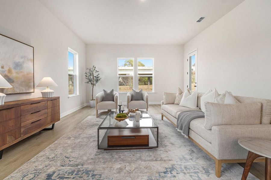 Representative furnished interior of a home built from the Zion - Waterway by Ashton Woods in Blue Heron Retreat, Little River (Image 3).