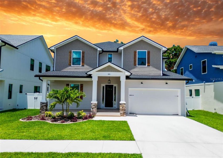 Front exterior of a new home in , Tampa, FL, highlighting curb appeal (Image 26).