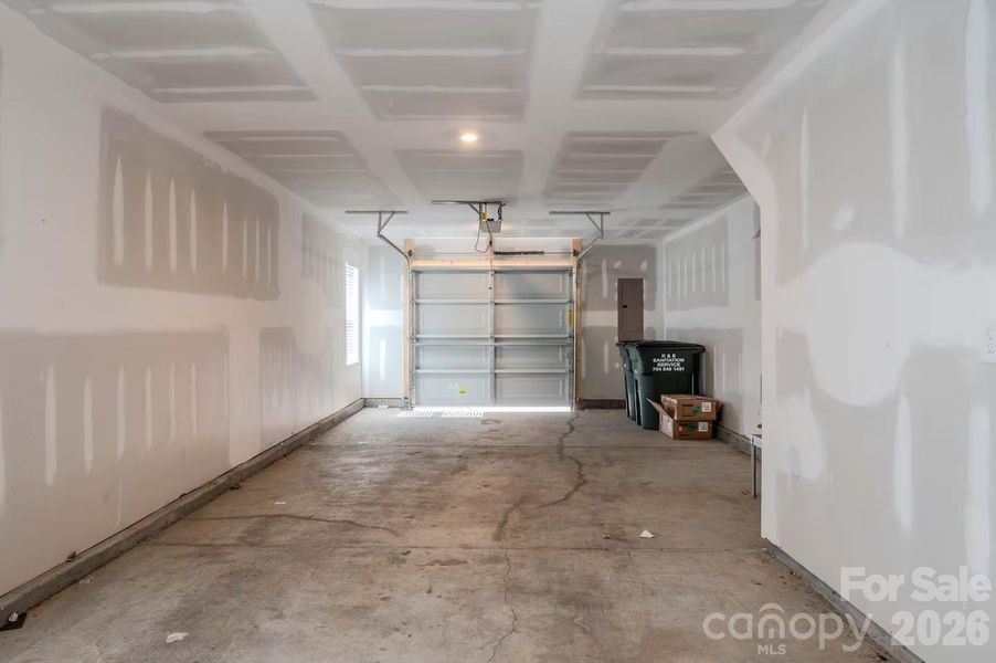 The oversized two-car tandem garage provides ample space for parking, additional storage, a home gym, or hobby area, offering exceptional flexibility to fit your lifestyle." The oversized two-car tandem garage provides ample space for parking, additional storage, a home gym, or hobby area, offering exceptional flexibility to fit your lifestyle."