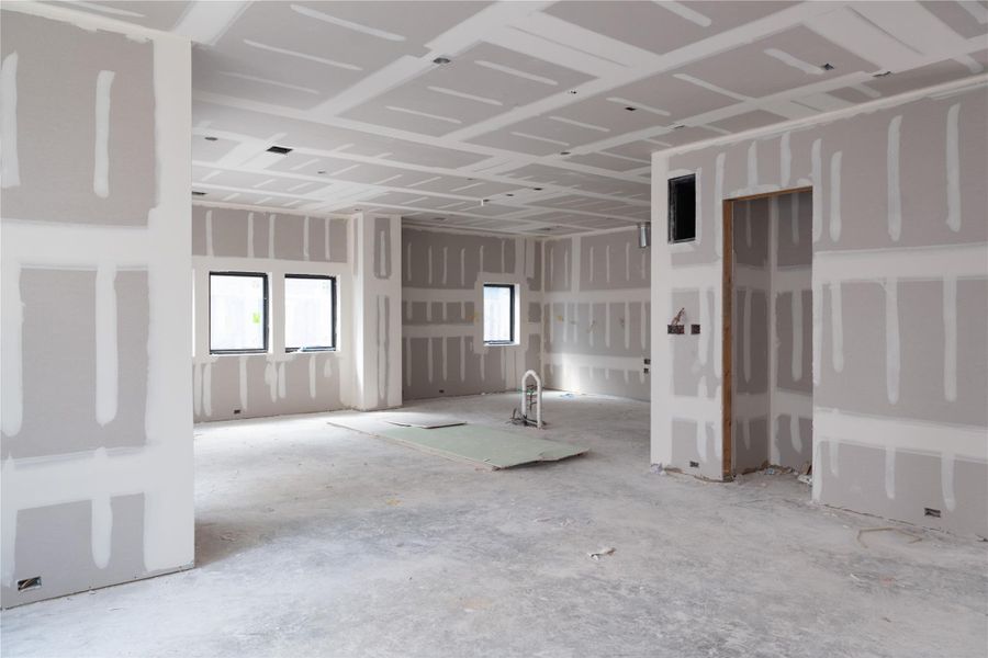 View from the living room looking back to the kitchen/dining in Unit B/C.