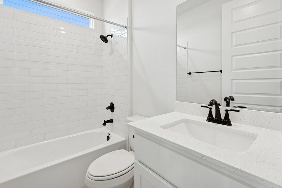 Furnished interior view inside a new home in University Heights, Round Rock (Image 11).