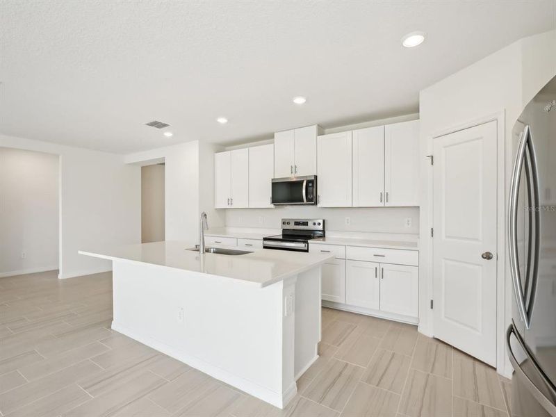Furnished interior view inside a new home in Benton Hills - Classic Series, Brooksville (Image 12).