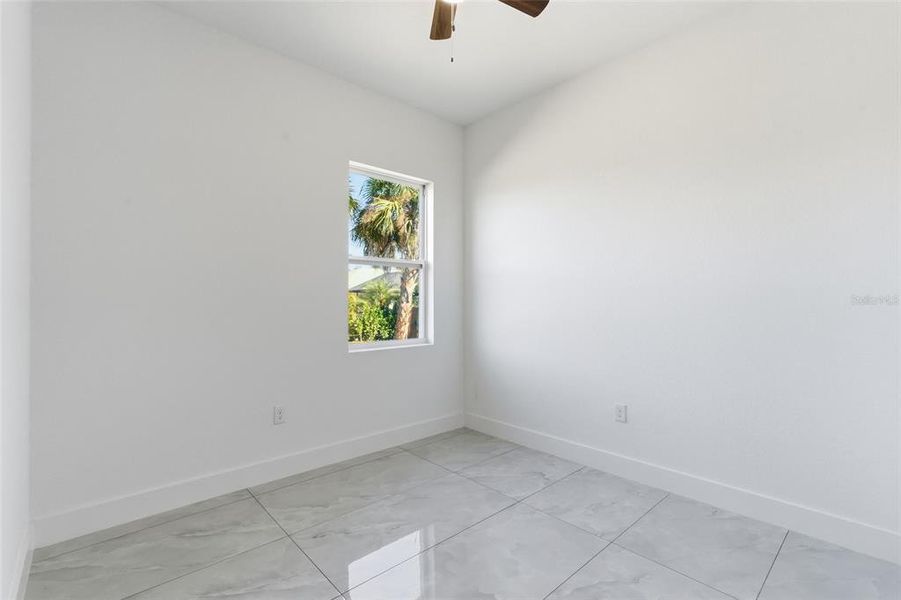 Spacious, unfurnished interior of a new home in , Port Charlotte (Image 18).