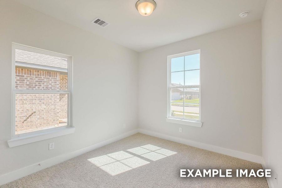 Spacious, unfurnished interior of a new home in Sunterra, Katy (Image 27).
