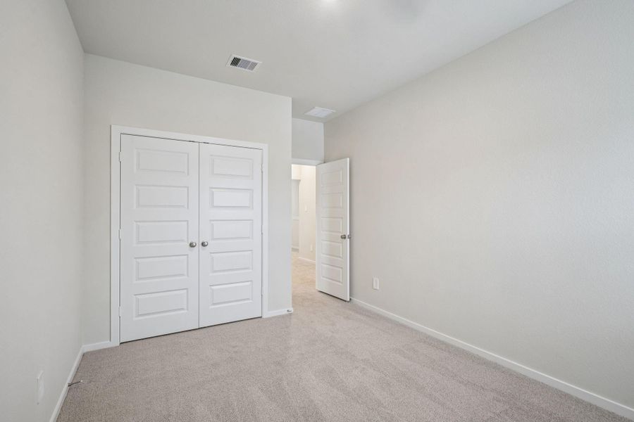 Spacious, unfurnished interior of a new home in Pinewood Trails - City Series, Atascocita (Image 33).