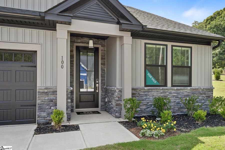 Exterior details and patio area of a home in Saratoga Oaks, Williamston (Image 25).
