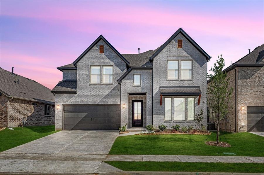 Front exterior of a new home in Creekview Meadows, Celina, TX, highlighting curb appeal (Image 1).