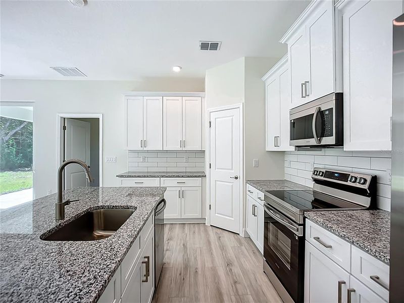 Furnished interior view inside a new home in , North Port (Image 3).