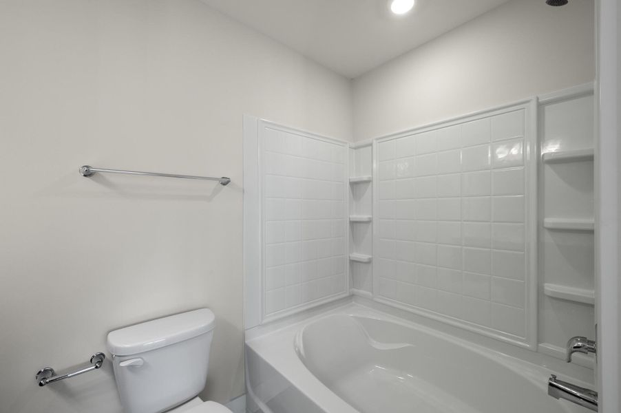 Photo is of a similar home