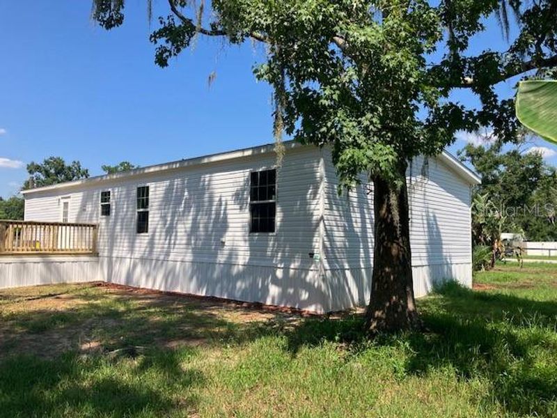 Front exterior of a new home in , Wesley Chapel, FL, highlighting curb appeal (Image 2).