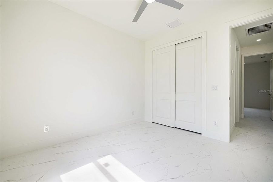 Spacious, unfurnished interior of a new home in , Port Charlotte (Image 24).