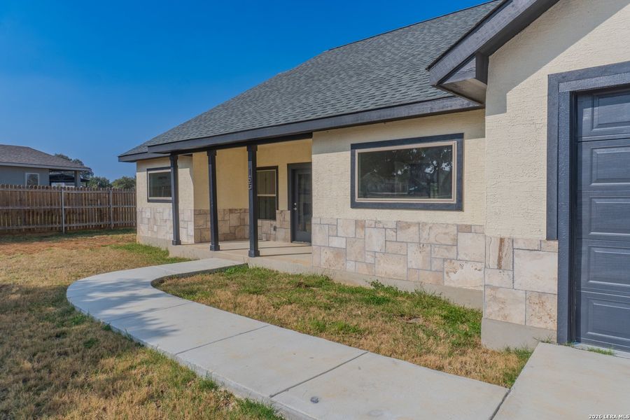 Exterior details and patio area of a home in , Lytle (Image 29).