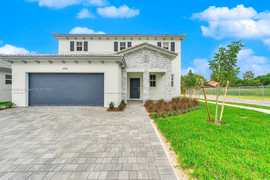 Front exterior of a new home in , Miami, FL, highlighting curb appeal (Image 22). Front exterior of a new home in , Miami, FL, highlighting curb appeal (Image 22).