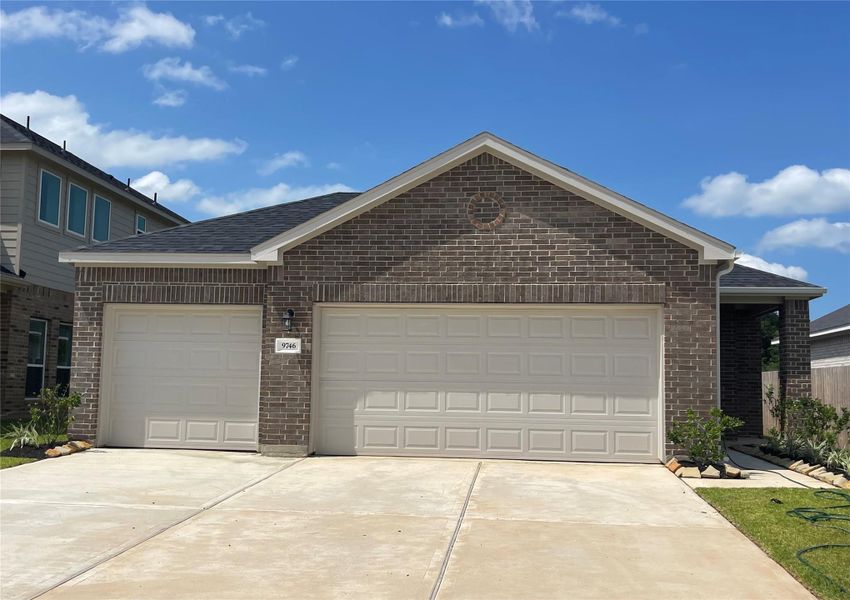 Front exterior of a new home in Enclave at Willis, Willis, TX, highlighting curb appeal (Image 1). Front exterior of a new home in Enclave at Willis, Willis, TX, highlighting curb appeal (Image 1).