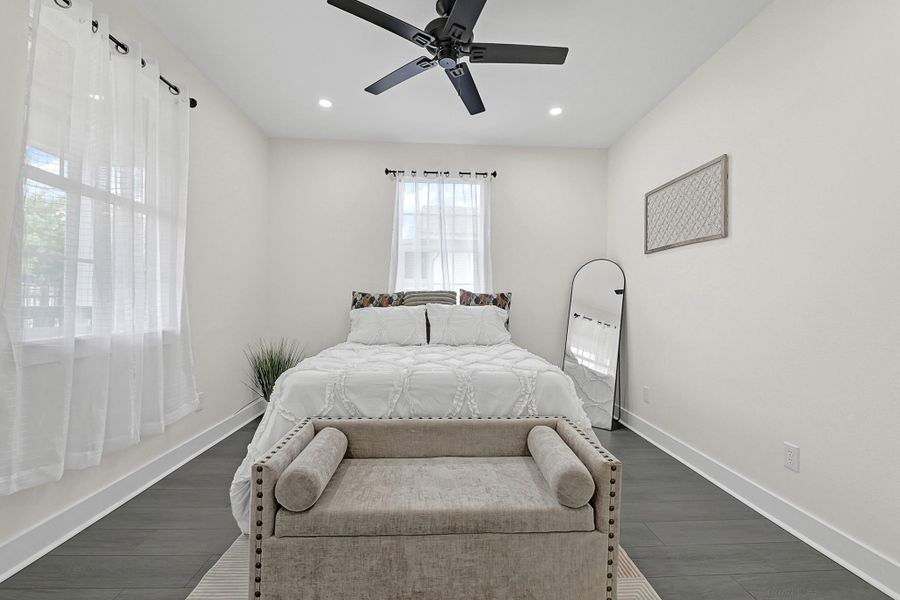 Sleek, contemporary flooring enhances the room's modern appeal. Sleek, contemporary flooring enhances the room's modern appeal.