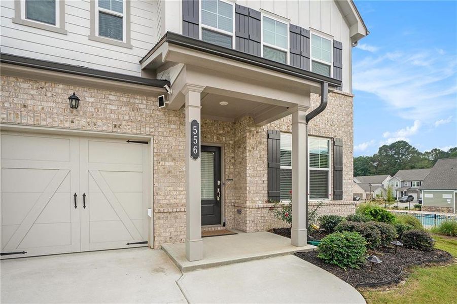 Exterior details and patio area of a home in , Loganville (Image 20).