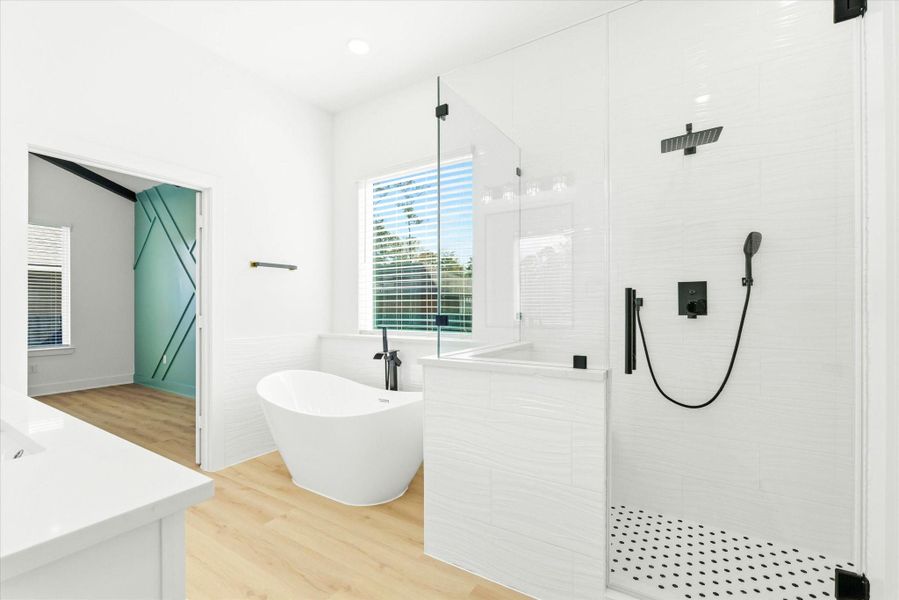 No need to choose between a relaxing bath or a steamy shower—enjoy both in the comfort of your private en-suite.