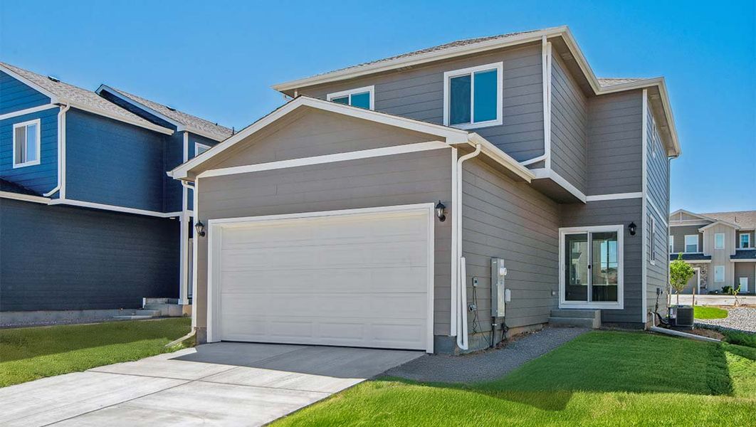 Representative exterior photo of a completed home built from the DOUGLAS by D.R. Horton in Horizon Uptown, Aurora, CO (Image 19).