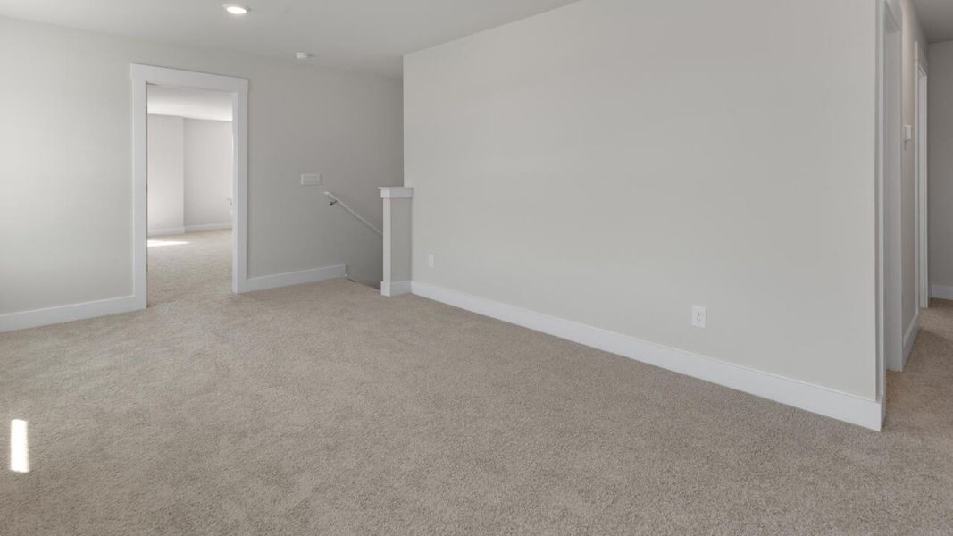 Representative unfurnished interior of a home built from the WREN by D.R. Horton in Indigo Preserve, Leland (Image 26). Representative unfurnished interior of a home built from the WREN by D.R. Horton in Indigo Preserve, Leland (Image 26).