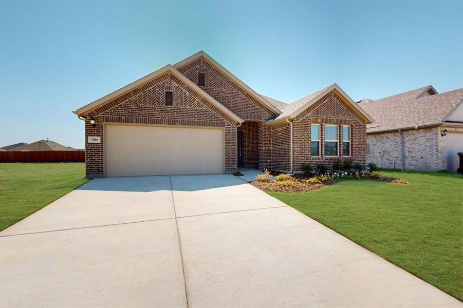 Front exterior of a new home in Sagebrook, Argyle, TX, highlighting curb appeal (Image 16). Front exterior of a new home in Sagebrook, Argyle, TX, highlighting curb appeal (Image 16).