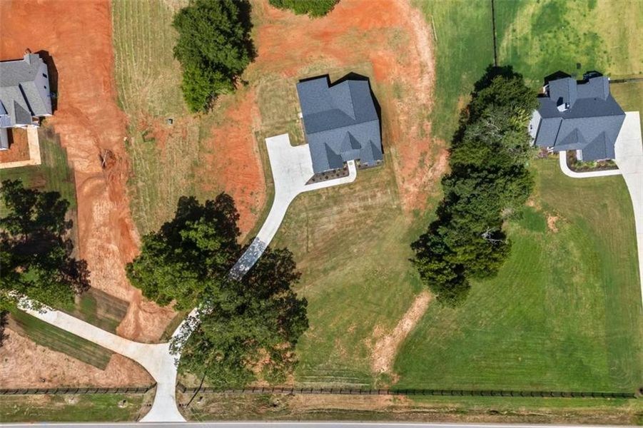 Front exterior of a new home in , Monroe, GA, highlighting curb appeal (Image 32).