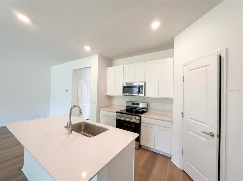 Furnished interior view inside a new home in Grand Park, Dunnellon (Image 11).