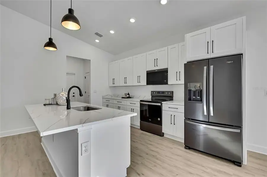 Furnished interior view inside a new home in , Weeki Wachee (Image 7).