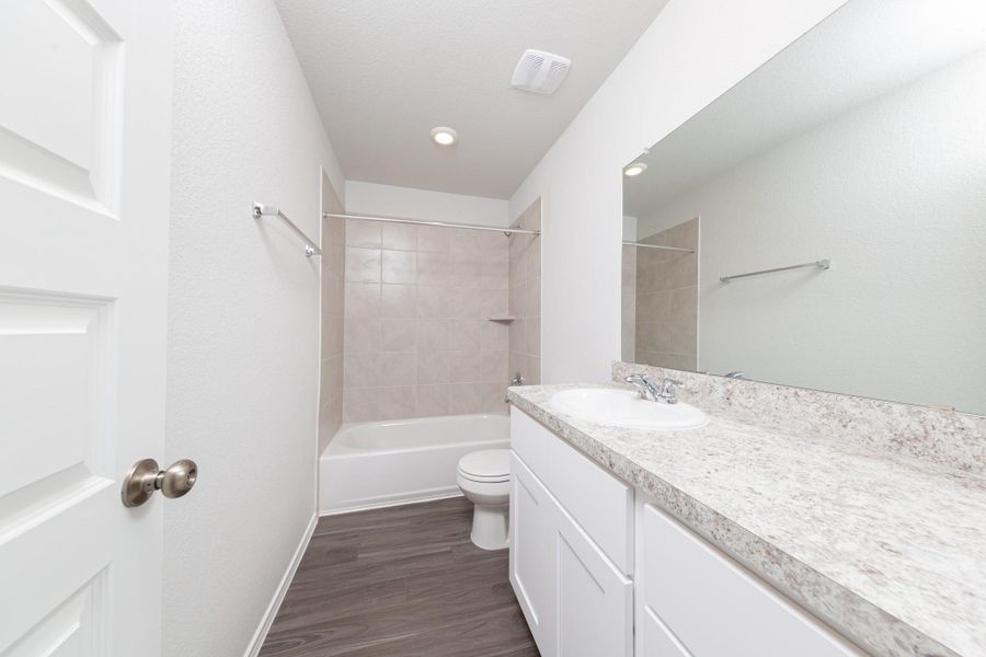 Furnished interior view inside a new home in Townsend Reserve, Splendora (Image 7).