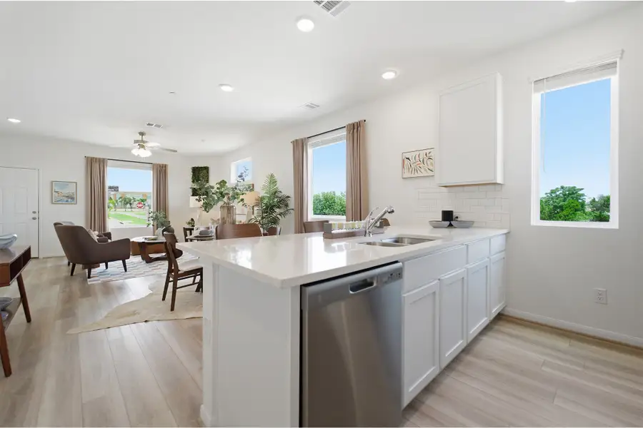 Representative furnished interior of a home built from the Kahn by CastleRock Communities in Municipal Drive Townhomes, Leander (Image 15).