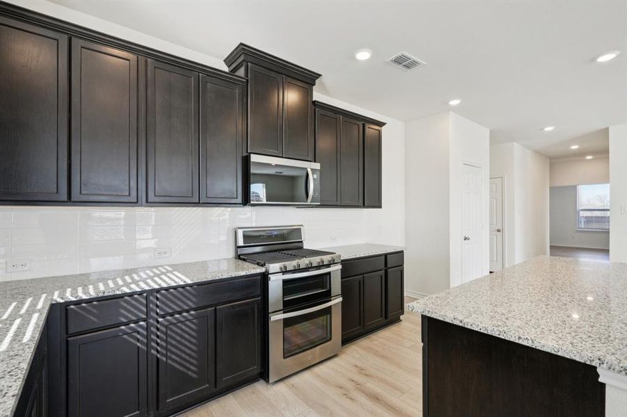 Furnished interior view inside a new home in Heartland Signature, Crandall (Image 6).
