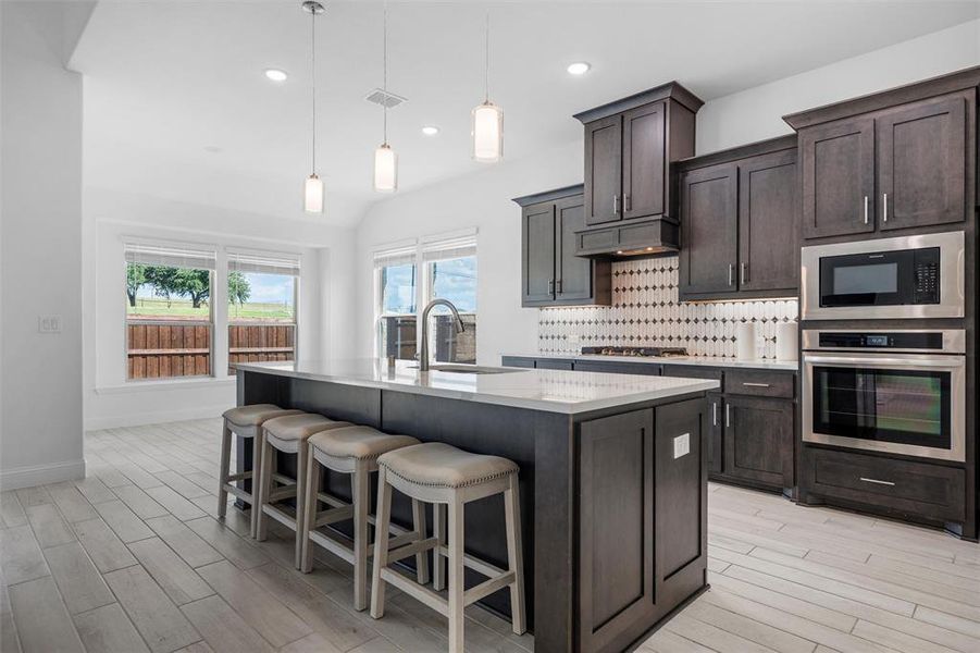 Furnished interior view inside a new home in Fox Hollow, Forney (Image 5).