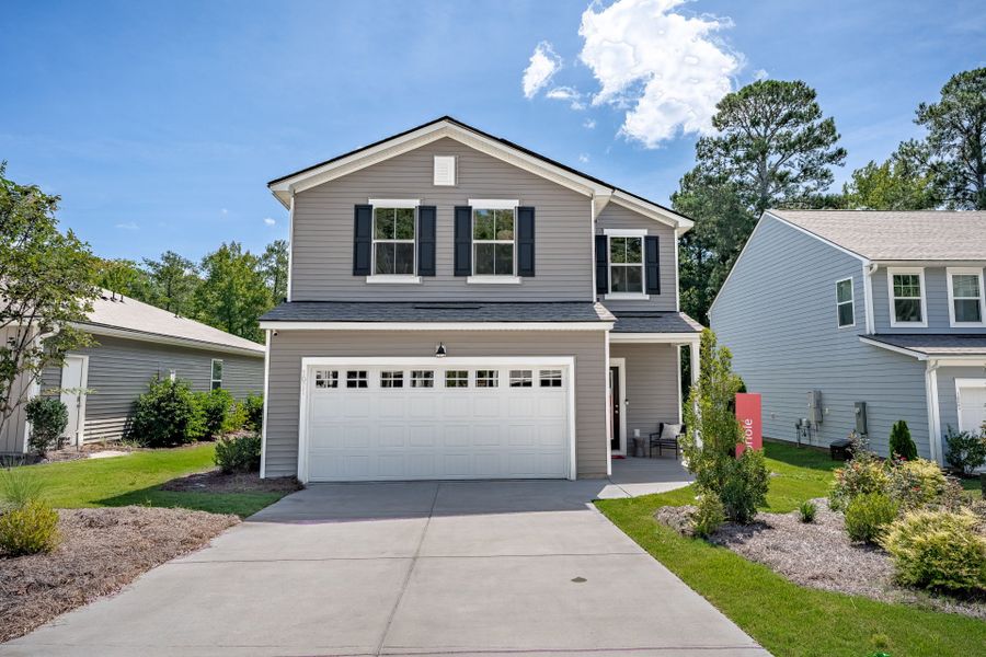 Front exterior of a new home in Grand Arbor, Blythewood, SC, highlighting curb appeal (Image 27).