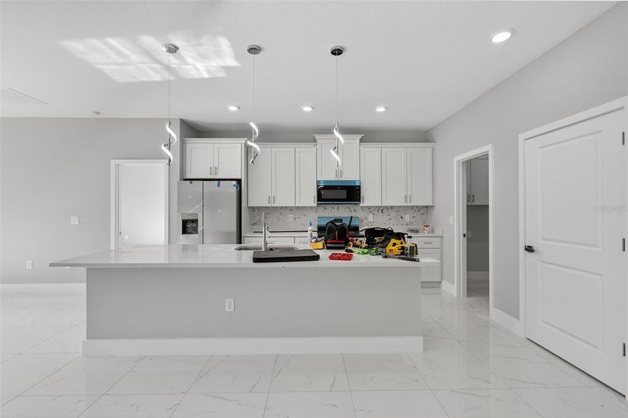 Furnished interior view inside a new home in , Port Charlotte (Image 12).