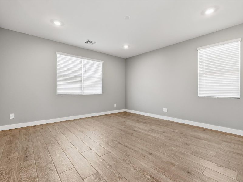Spacious, unfurnished interior of a new home in Blossom Rock Reserve Series, Apache Junction (Image 12). Spacious, unfurnished interior of a new home in Blossom Rock Reserve Series, Apache Junction (Image 12).