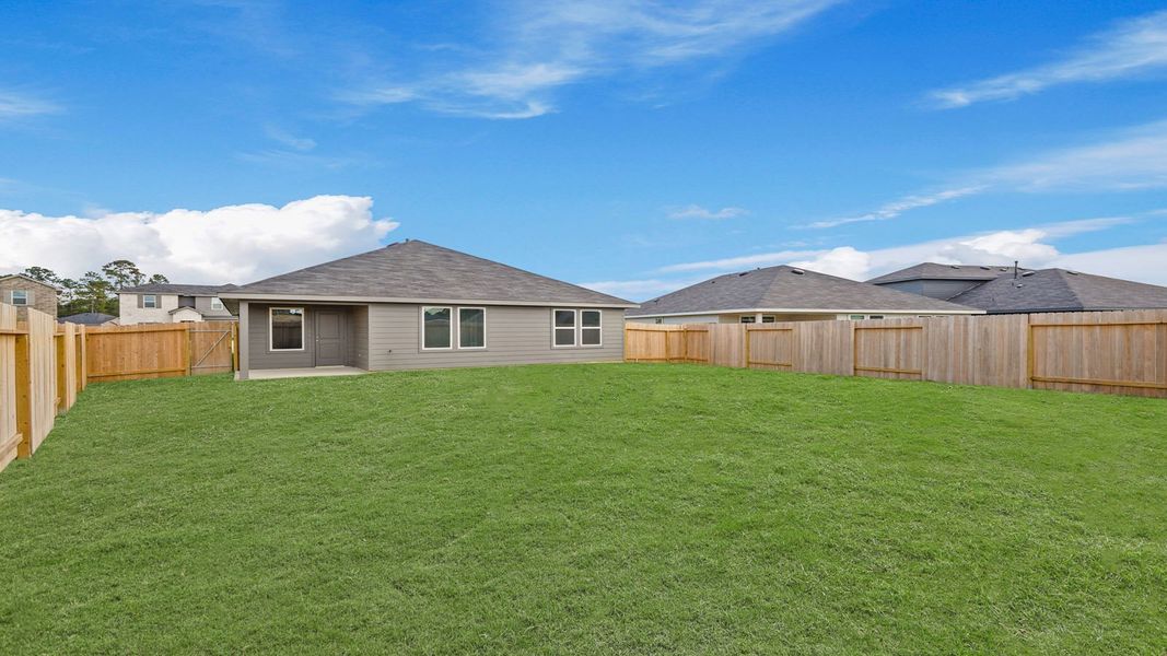 Exterior details and patio area of a home in Grand Pines, Magnolia (Image 4).