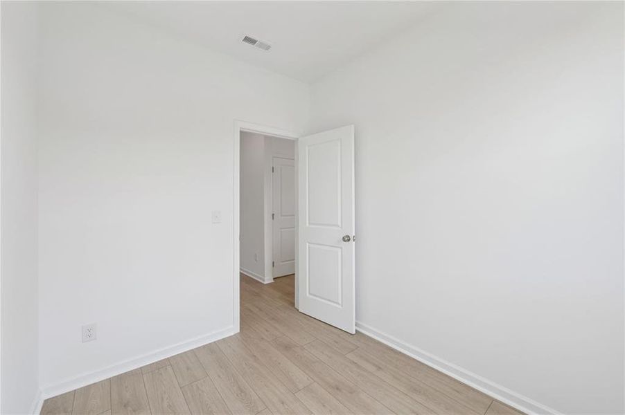 Spacious, unfurnished interior of a new home in Windance Lake, Loganville (Image 37).