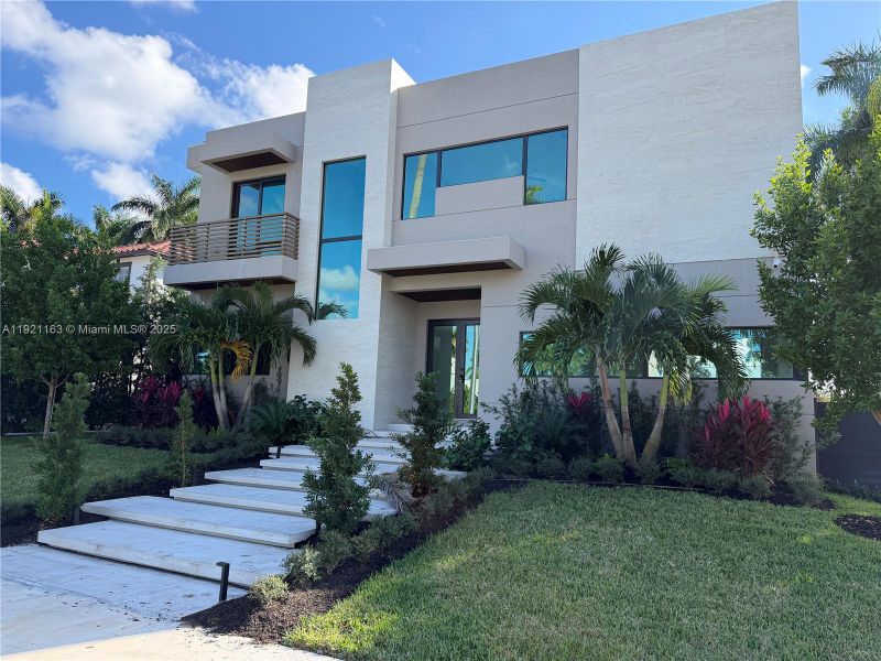 Front exterior of a new home in , Hollywood, FL, highlighting curb appeal (Image 27).