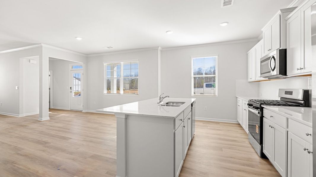 Representative furnished interior of a home built from the Carroll ll by D.R. Horton in Braselton Village, Braselton (Image 5).