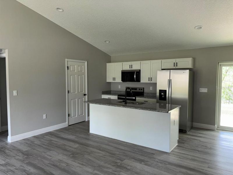 Furnished interior view inside a new home in , Dunnellon (Image 9).
