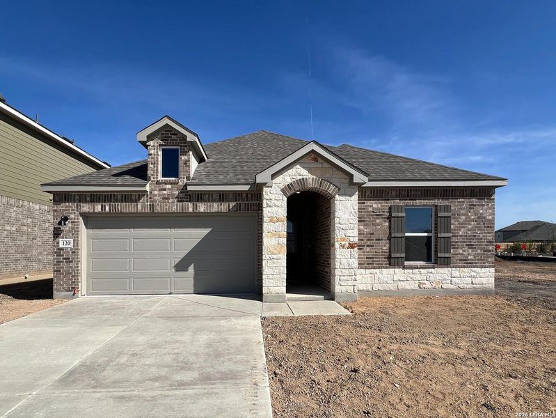 Front exterior of a new home in Nopal Valley, San Antonio, TX, highlighting curb appeal (Image 1). Front exterior of a new home in Nopal Valley, San Antonio, TX, highlighting curb appeal (Image 1).
