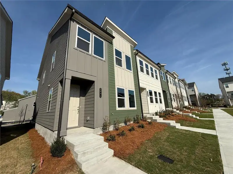 Front exterior of a new home in Park Vue, Atlanta, GA, highlighting curb appeal (Image 2). Front exterior of a new home in Park Vue, Atlanta, GA, highlighting curb appeal (Image 2).