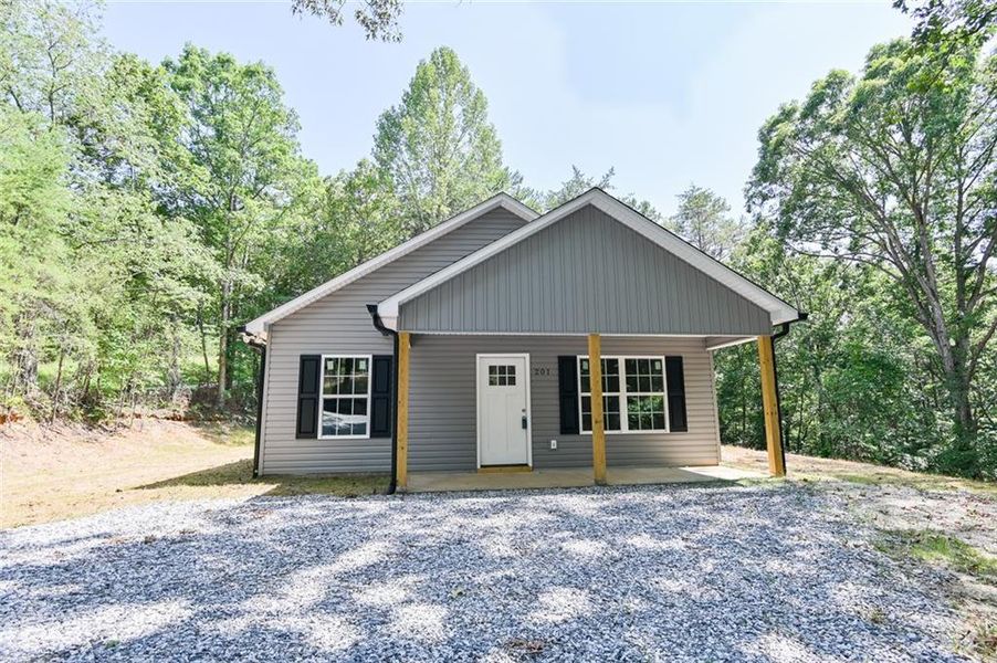 Front exterior of a new home in , Dahlonega, GA, highlighting curb appeal (Image 21).