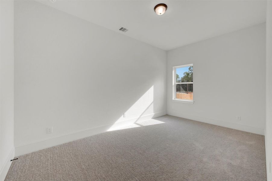 Spacious, unfurnished interior of a new home in The Woodlands Hills - Premier Collection, Willis (Image 15).