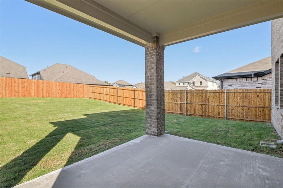 Exterior details and patio area of a home in Simpson Crossing - Spring Series, McKinney (Image 26).