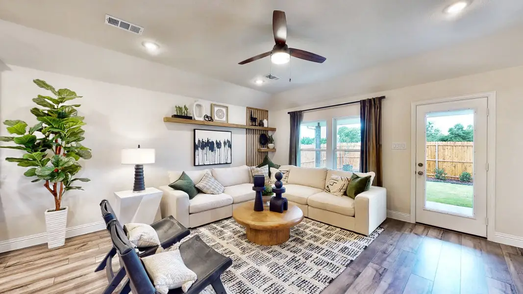 A living room with a large window.